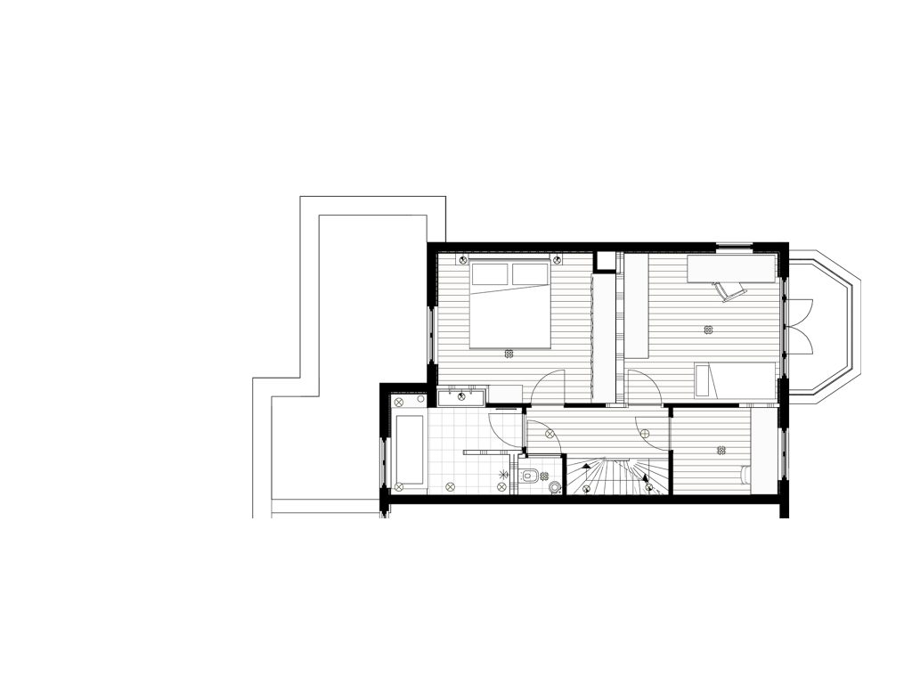 Indelingsplattegrond van de eerste verdieping met slaapkamer en een badkamer. 